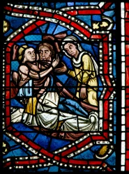 Window depicting Lot messes about with his daughters