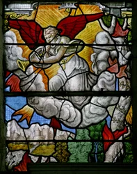 Window w5 depicting a scene from the Book of Revelation: one of the seven angels with trumpets