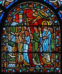 Window wXXI depicting a procession with a saint