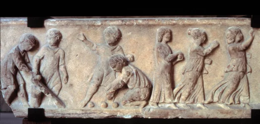 Gallo Roman art: marble frieze in low relief from a sarcophagus representing children playing ball. 2nd century AD. Paris, Louvre Museum