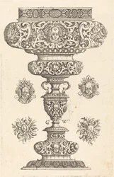Goblet, rim decorated with masque and bouquet of fruit