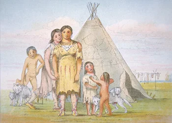 A Comanche family outside their teepee