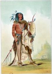 Indians of America: Portrait of an Indian chief who became a doctor holds a tam tam in which are the remedies. Illustration by George Catlin