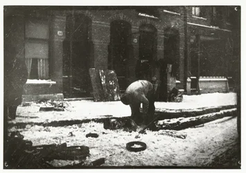 Construction Worker at Work in the Snow in Amsterdam