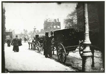View of Leidseplein in Amsterdam with Carriage Traffic on a Winter Day