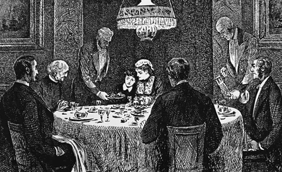 An upper class family at the table