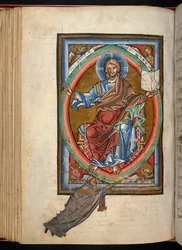 Arundel 156, f.99v, Christ sits enthroned in majesty within a mandorla, surrounded by the four symbols of the Evangelists, from 