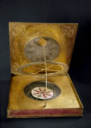 Universal solar clock made of copper, gold brad, glass and paper made in Germany. Early 17th century