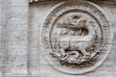 Coat of arms on facade of St Louis of French church