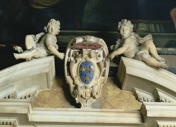 Interior view of the Barberini Chapel, detail of decorative pediment of two cherubs supporting a coat of arms, marble and lapis lazuli