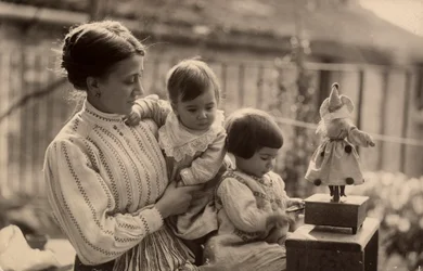 Woman with Babies and Doll