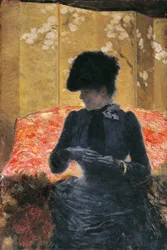 Woman on red sofa