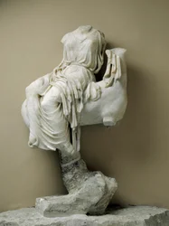 Female statue draped as a votive offering