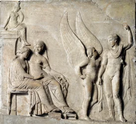 Greek art: “Paris, Prince of Sparta, seduces Helen of Troy; Aphrodite is depicted”. Marble relief after a Greek original. 1st century BC. Museo Archeologico Nazionale, Naples
