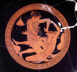 Minotaur killed by Theseus - Greek vase kept at the Museo Archeologico de Firenze. Interior of the pentic cup with red figures, painter of Dokimasia. 480 BC.