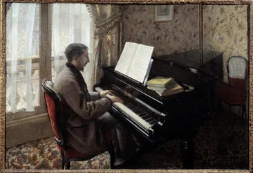 Young man playing piano