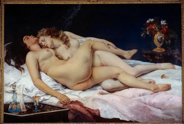 Sleep. Two naked women hugged in a bed