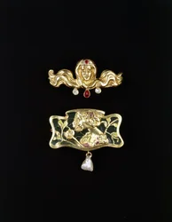 An Art Nouveau Brooch by Gustave-Roger Sandoz, and an Art Nouveau Brooch Shaped Metal Set with Plique a Jour and a Pearl Drop, Gold Coloured Brooch and Precious Stones, c.1900
