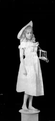 Statuary from Life; Girl Holding Birdcage, c. 1890