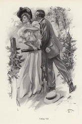 Man trying to steal a kiss from a young woman