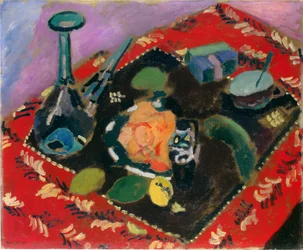 Dishes and Fruit on a Red and Black Carpet