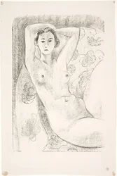 Female model, seated in an armchair