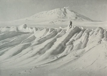 Mount Erebus Over a Water-Worn Iceberg