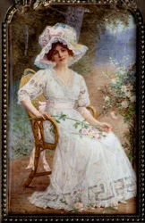 Young Woman Sitting in the Garden