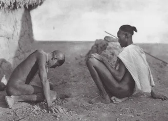 Africa: Medicine-man bleeding a patient