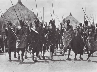 Africa: Shilluk warriors storming the grave of a chief