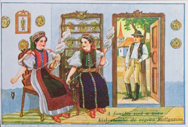 Postcard depicting women in traditional Hungarian dress spinning and singing the popular song Sing a Song to the Frog, c.1940