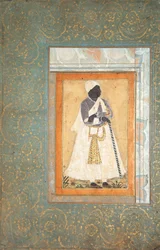 A Black Man Leans on a Long Staff