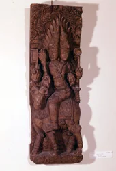 Agni, god of fire, depicted with two heads (bicephal) on a ram, according to Hindu mythology. Wood sculpture of the 17th century. Paris, Musée Guimet.