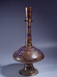Islamic Art: bottle with long enameled glass neck of Vice King Tuquztemur, 1345 approx., from Egypt or Syria