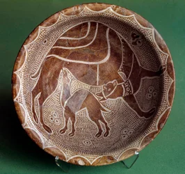 Islamic art: cut to the camel nursing her baby. From Iraq. 10th century. Paris, Louvre Museum