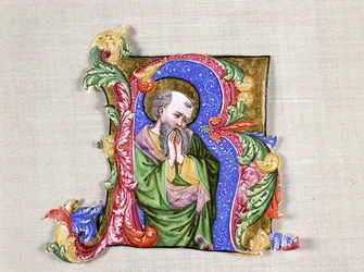 A Praying Saint, a large historiated initial R, c.1400