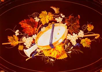 Table top with musical instruments and vines