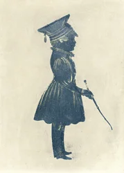 Silhouette of a Boy with a Hat and a Stick