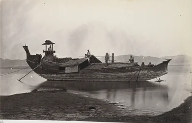A Beam View of a Laung-Zat or Paddy Boat Moored at the Side of the Irrawaddy River