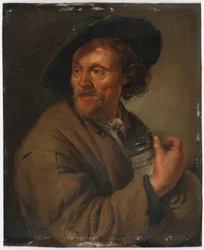 Man Holding a Jug