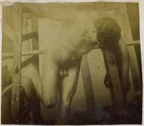 Study of a Male Nude Model, Leaning Forward in a Wooden Structure, in the Studio of Jacques de Lalaing