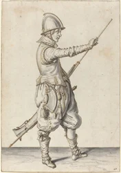 Elegantly Dressed Soldier Tamping His Caliver