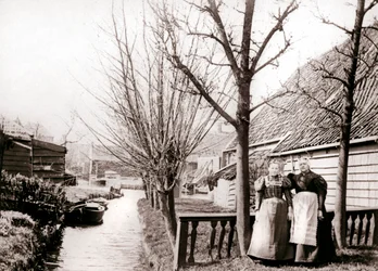 Two women on a canal bank, Broek, Netherlands