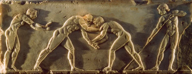 Ancient Greek athletes depicted on a 6th century B.C. bas-relief. National Archaeological...