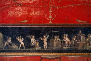 Fresco uncovered at Pompeii shows goldsmithing cherubs at work. Pompeii, Italy.
