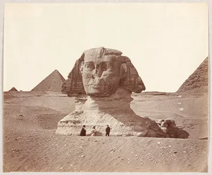 Egypt. Giza. Sphinx with the Pyramid of Menkaure in the Background