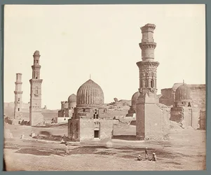 Egypt. Cairo. Southern Necropolis. In the foreground, the minaret by the mausoleum of Ali Badr Al-Karafi (1300-1310), in the background the Kusum minaret from the Mamluk period