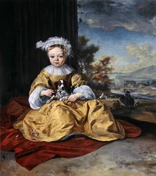 A Child in a yellow dress holding a dog