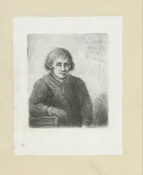 Young Man Leaning on a Table