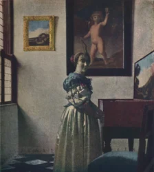 A Lady Standing at the Virginals